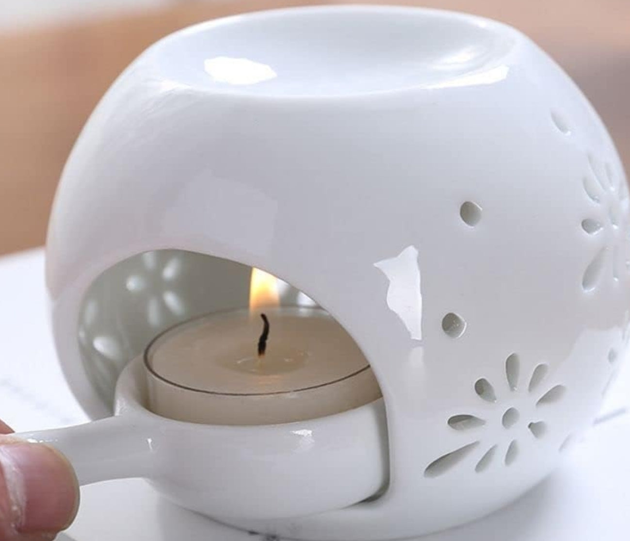 Brûleur de cire avec une boite de galet