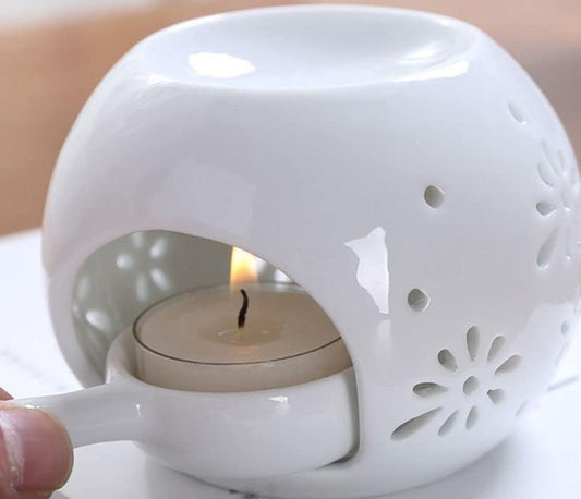 Brûleur de cire avec une boite de galet